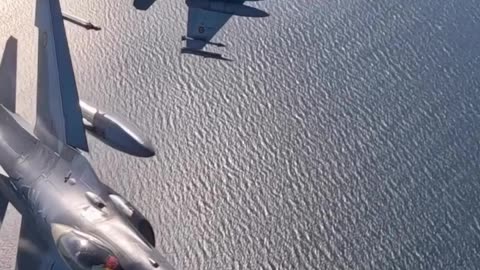 F-16s Breaking Formation: Romanian Falcons Soar Over Baltic Skies (Slow Motion)