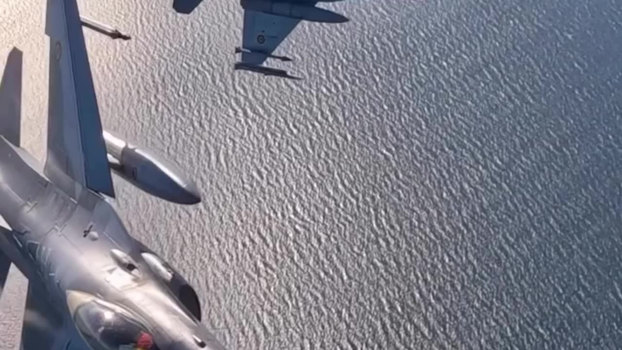 F-16s Breaking Formation: Romanian Falcons Soar Over Baltic Skies (Slow Motion)