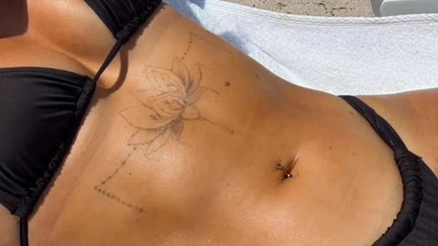 Victoria Rose (Woah Vicky) working on her tan