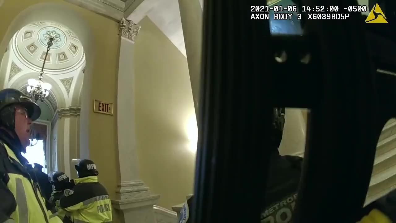 J6 undercover cops had wrist bands, candy stripe on guns