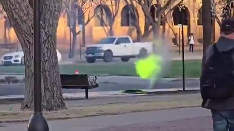 A manhole shooting green fire