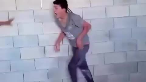 In Gaza, a Palestinian boy with special needs was tied to a wall by his..