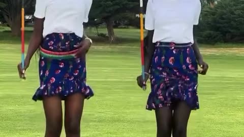Beautiful tall african tribe girls jumping