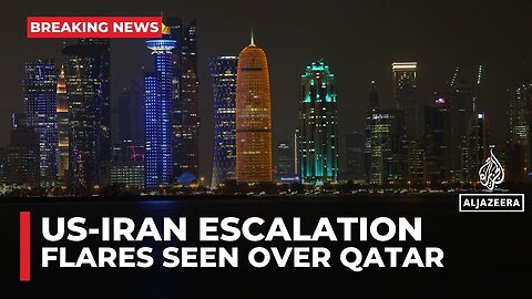 Explosions_ flares over Qatar_s capital amid threat of attack on US bases