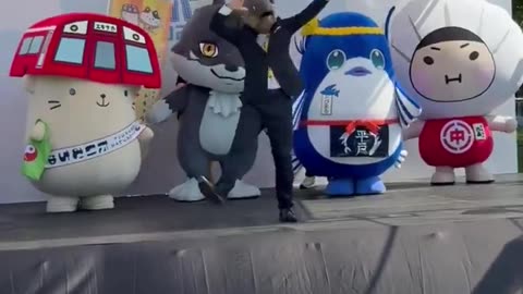 😮💃 PR Chief of Kanoya City, Japan, Dancing with an Amberjack Head! | FeedMyCuriosity