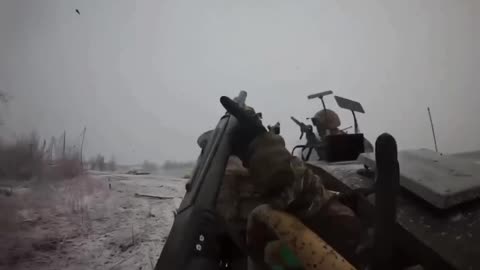 Ukrainian soldiers repel an attack by a Russian FPV drone.