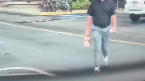 Man goes out of his way to spit on a Tesla in Hawaii.