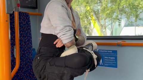 Girl Hanging on Her Hair on a Bus