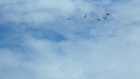 Planes flying at EAA 2025