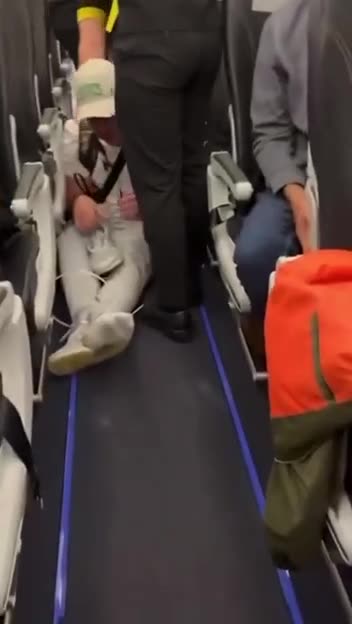 White Dude Beaten Up On A Plane