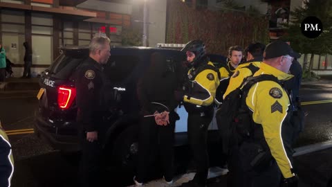 Portland Police take black bloc Antifa militant into custody outside the ICE facility,