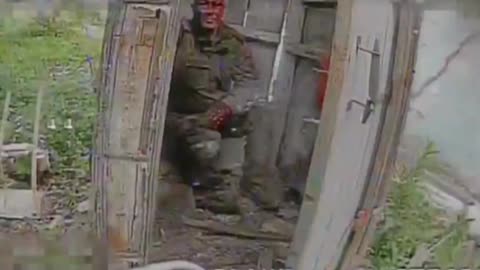 Blowing Russian Soldier Out the Back of an Outhouse