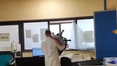 "I want to be seen now!" A North African man refuses to wait his turn, so he destroys