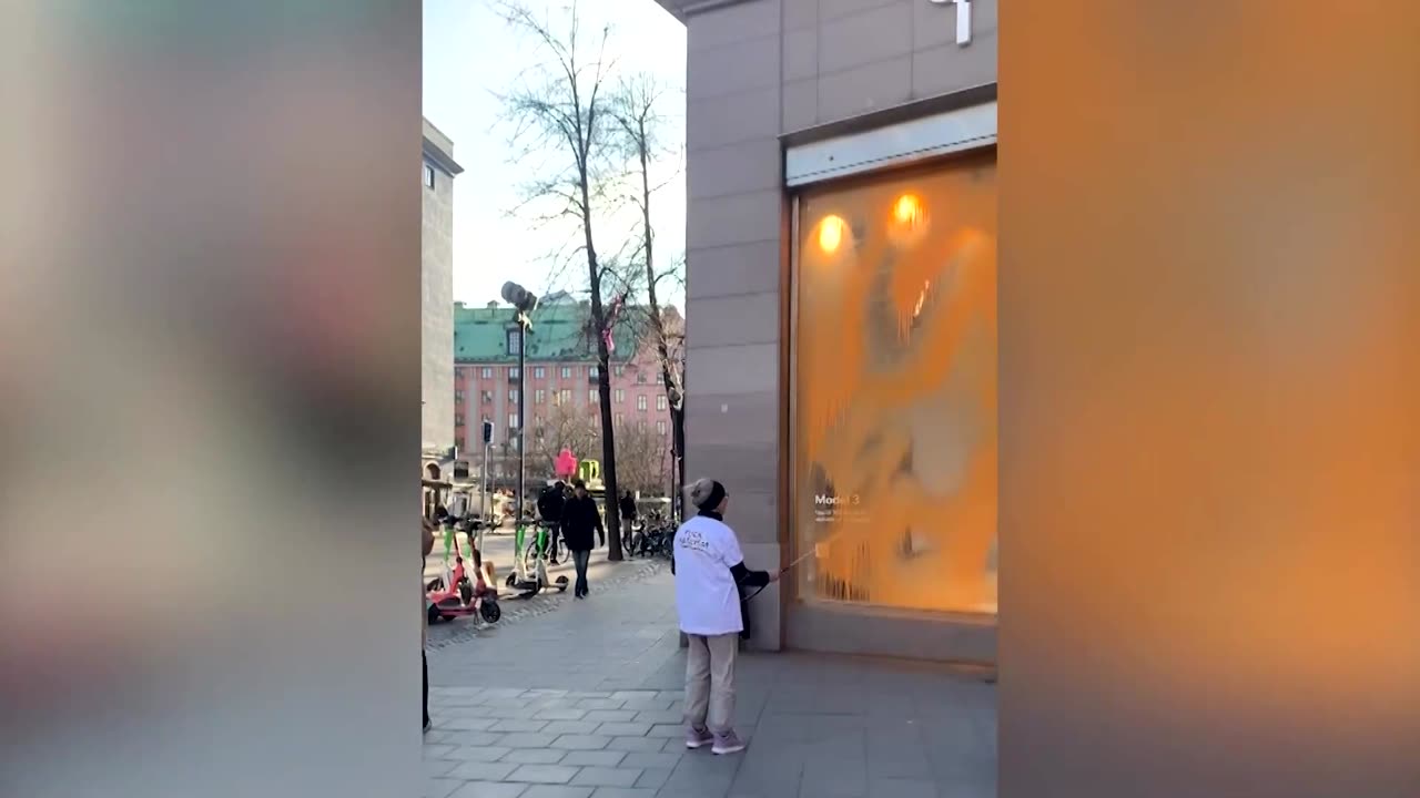 Two Tesla stores spray-painted in Sweden by environmentalists