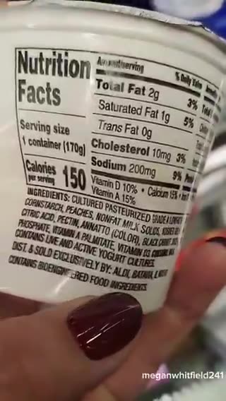 lady at grocery store shows that every thing she picks up says "Contains bioengineered ingredients"