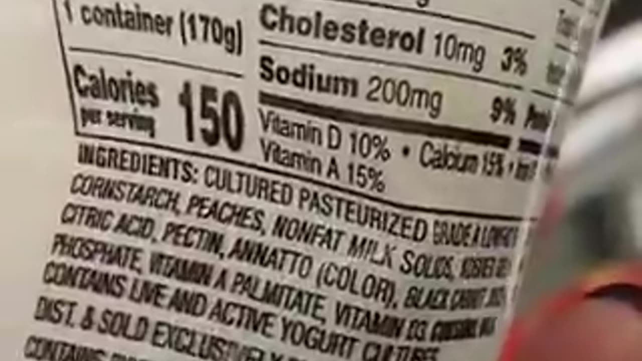 lady at grocery store shows that every thing she picks up says "Contains bioengineered ingredients"