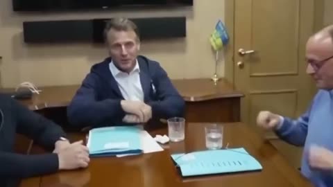A video of Macron quickly grabbing a package of what looked like cocaine...