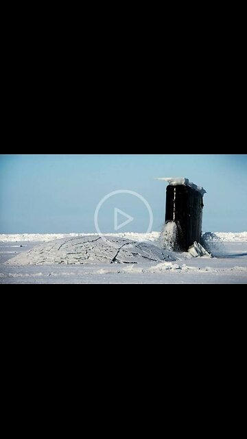 The USS Hartford submarine breaks through 40 centimeters of Arctic ice as it rises to the surface