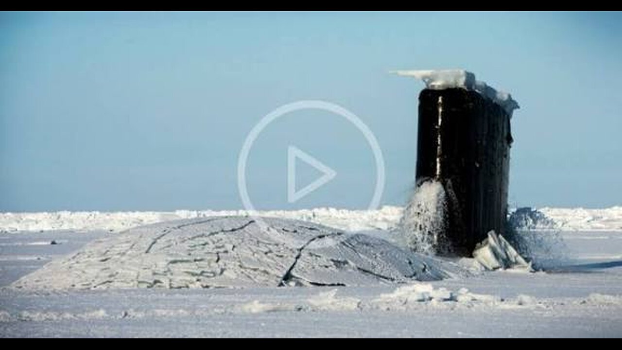 The USS Hartford submarine breaks through 40 centimeters of Arctic ice as it rises to the surface