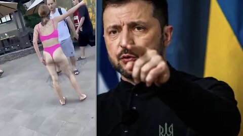 UKRAINE DARKNESS... Deranged SEMINUDE WOMAN ASSAULTS men to 'join the army'
