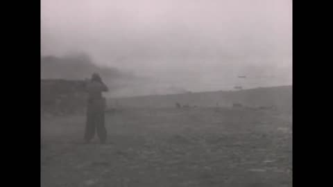 88mm_flak_gun_firing_from_its_transport_carriage