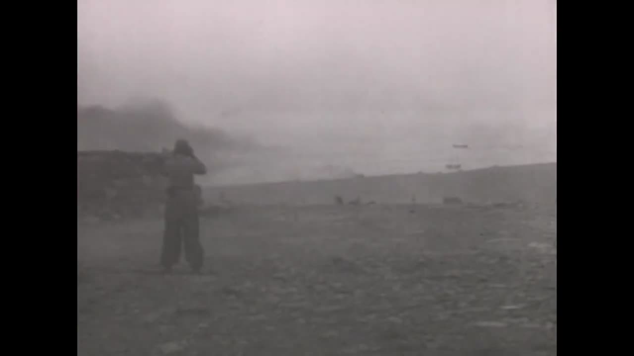 88mm_flak_gun_firing_from_its_transport_carriage