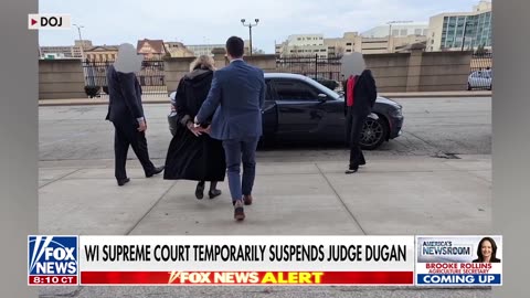 Judge temporarily suspended after arrest for aiding illegal immigrant