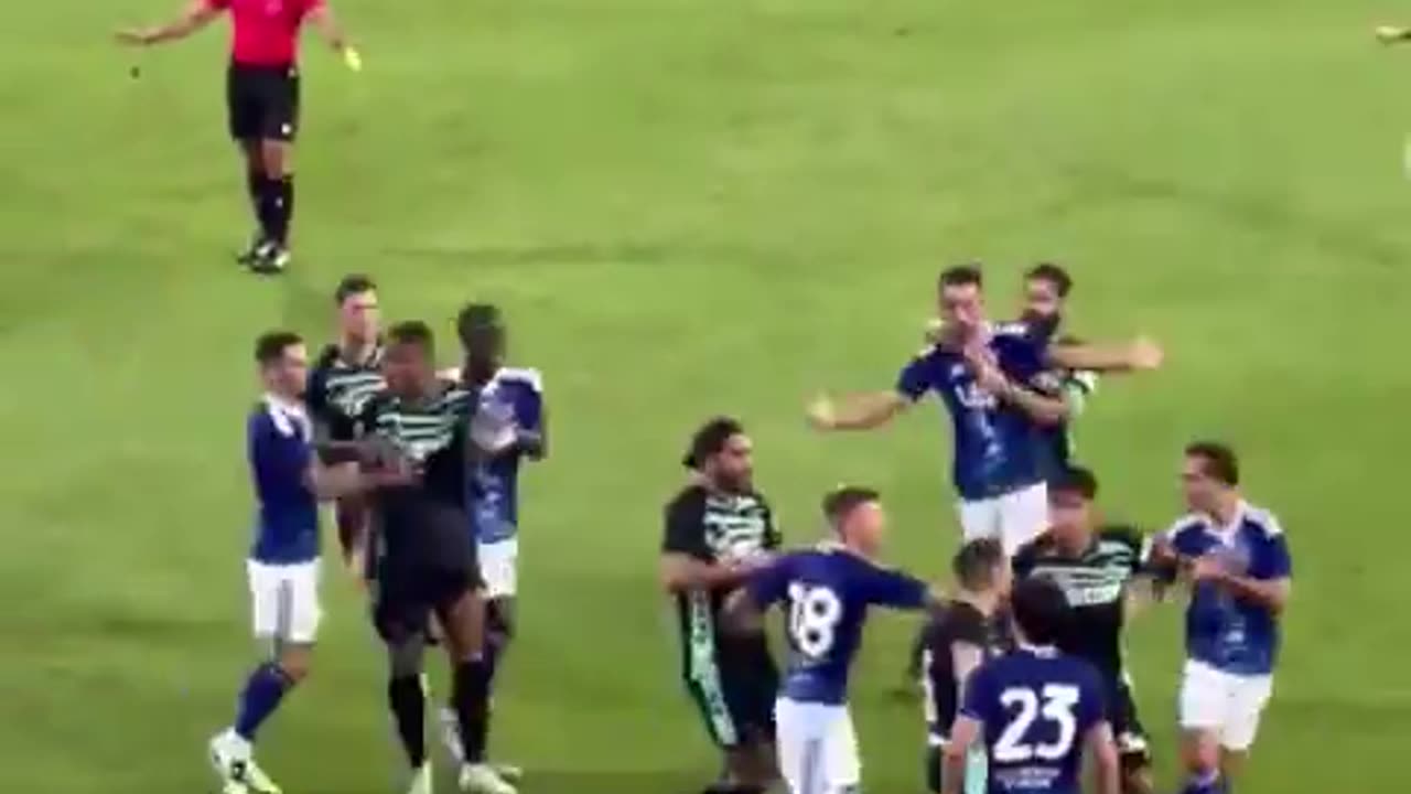 Como and Betis players exchange punches in a shameful scene.