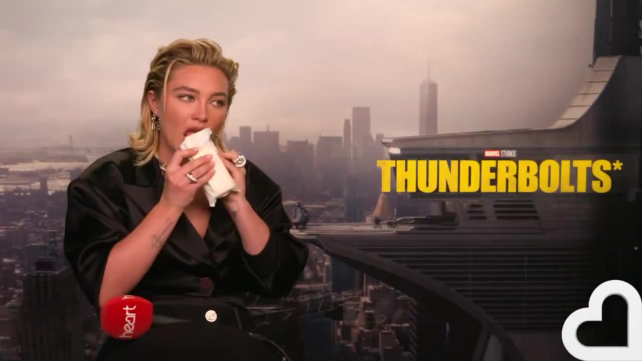 Florence Pugh being given cheese in an interview and immediately eating it..