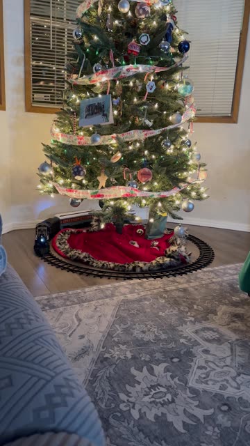 Sneak Attack On Holiday Train From Sphynx Cat