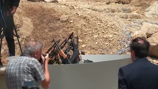 PKK fighters in Iraq burn weapons in disarming ceremony