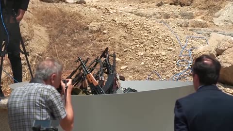 PKK fighters in Iraq burn weapons in disarming ceremony
