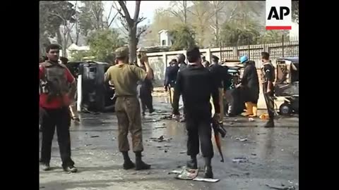 AP pix of suicide blast that killed at least 13