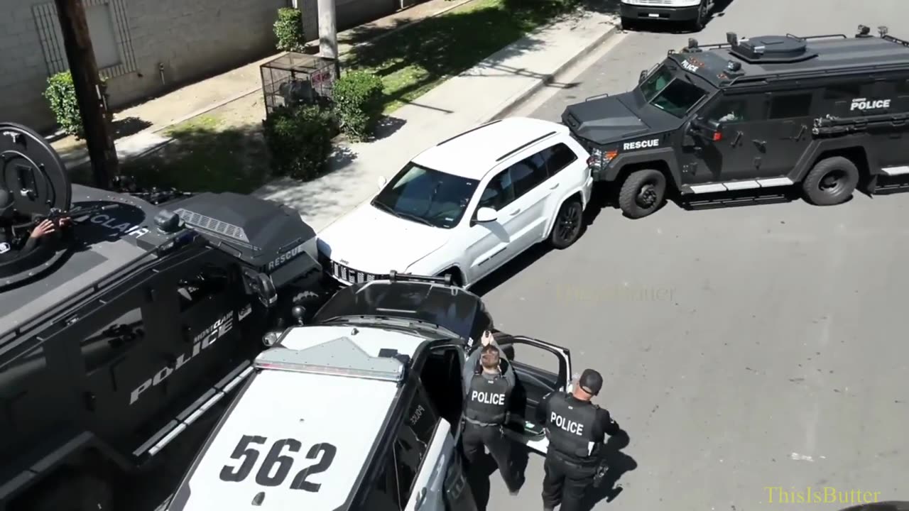 Domestic violence suspect shot by police when he held an object in a shooting stance after pursuit