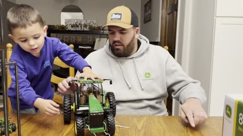 Opening up Ertles new 8400 with my son.