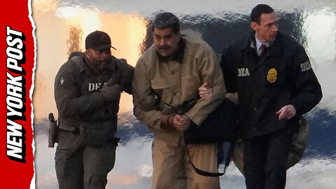 Cuffed Maduro arrives by helicopter to face charges in NYC
