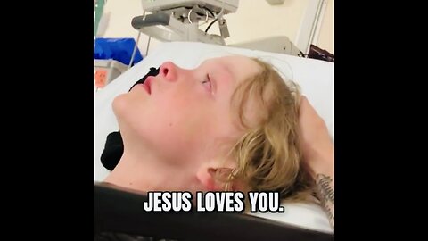 IN THE THROES OF AN NDE BOY HAS A VISION OF HIS DECEASED FATHER WITH JESUS