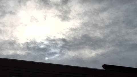 White sun and yellow sun through the "clouds"