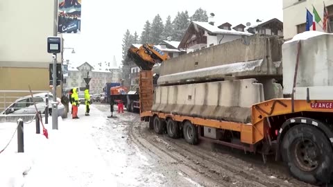 Snowfall hits Cortina as workers hurry to complete Olympic venues