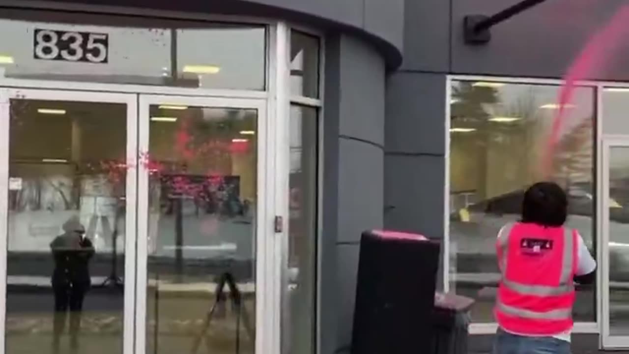 TESLA in Ottawa Canada 🇨🇦 being vandalized right now. This is a crime and they should be punished