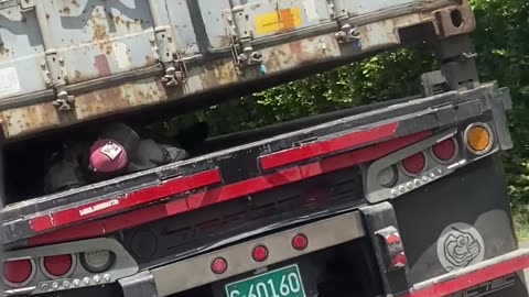 Man Naps Under Huge Truck Like It’s a Hammock