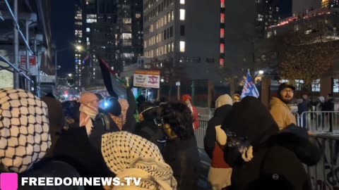 Pro-Palestine protesters pushed barricades and shouted at attendees outside a