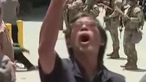 Disturbing Footage: Man Screams Extremist Chants at Riot