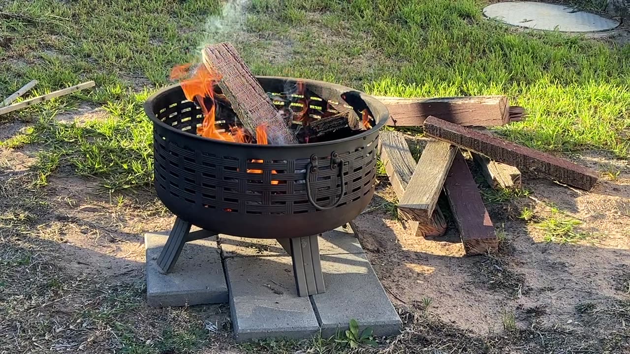 Burning all the old wood & having a BBQ at the back yard...