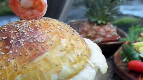 Würdest du diesen unglaublich leckeren Burger 🍔 mit Meeresfrüchten 🍤🦑