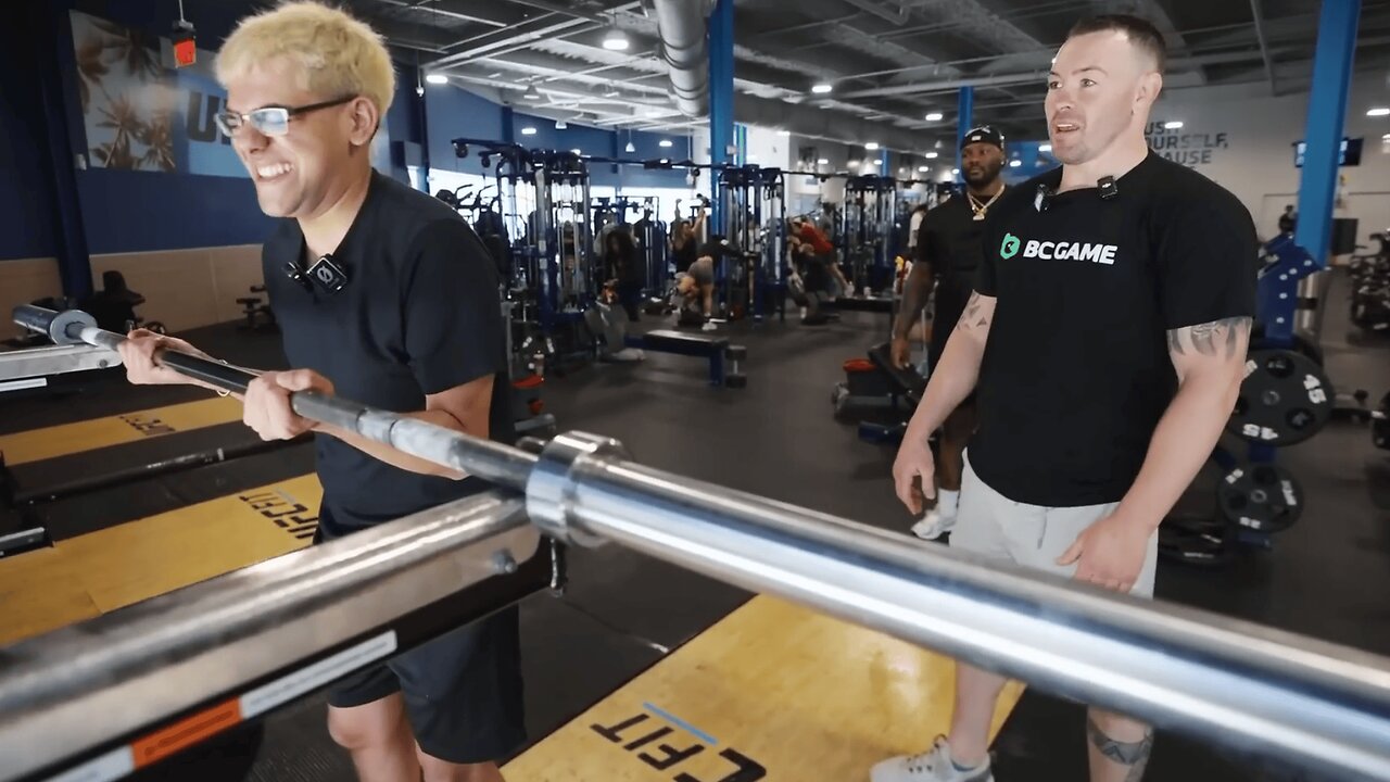N3on Struggles to Lift a Bar as Colby Covington Watches in Disbelief
