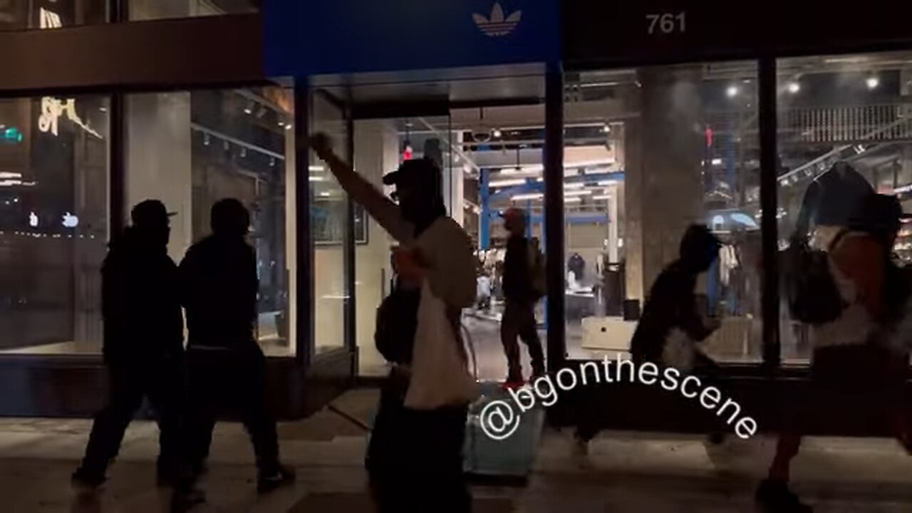 More chaos in LA –as looters flee Adidas store with armfuls of merchandise