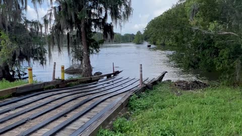 Driving a Mud Boat Over a Dam