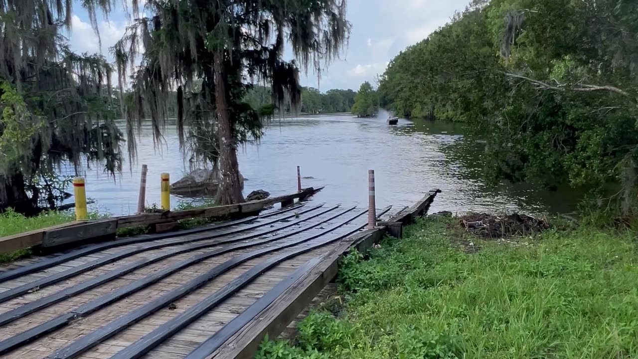 Driving a Mud Boat Over a Dam