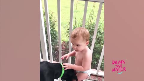 Funny baby playing with water